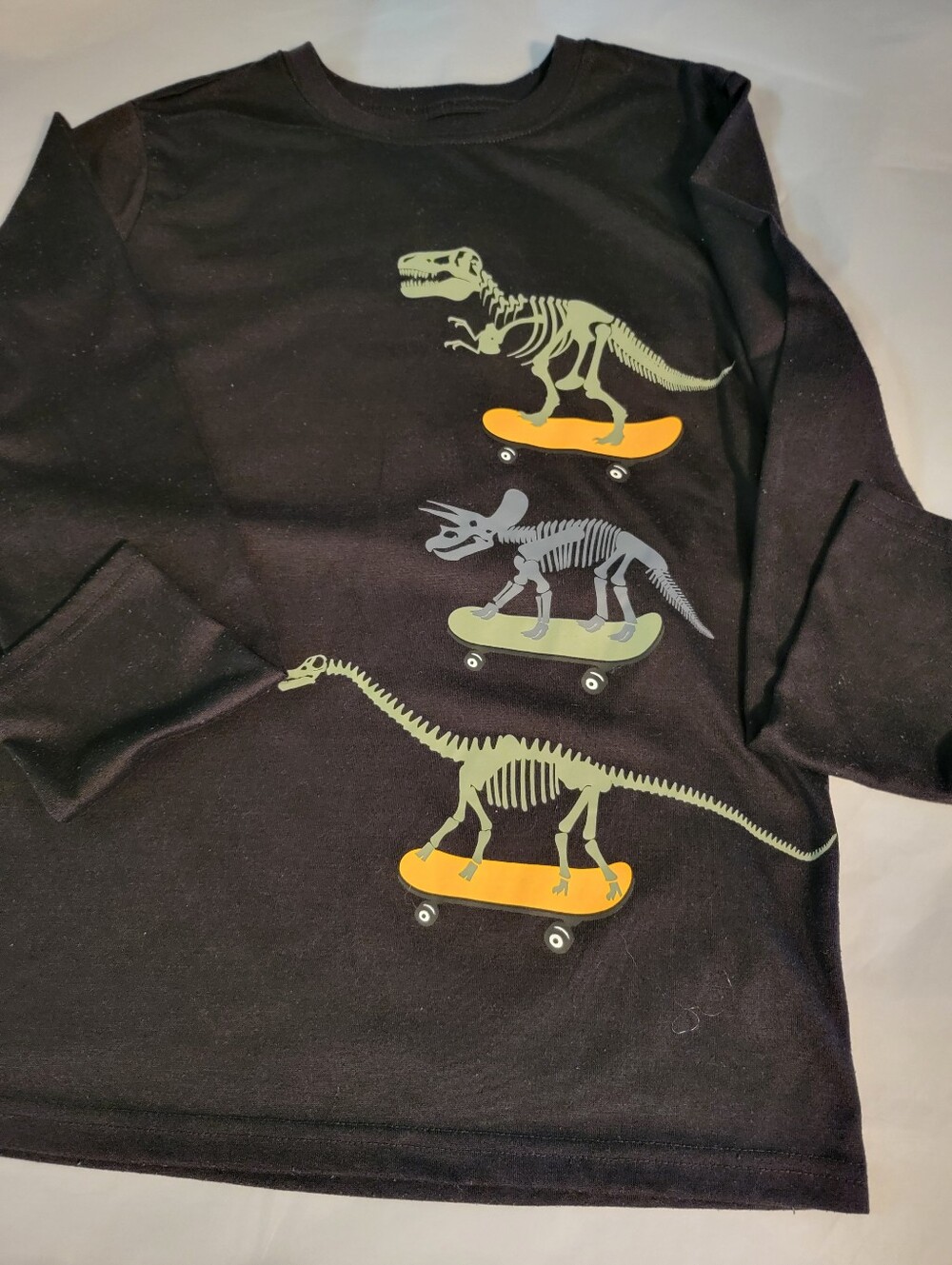 Kids Black Long-Sleeve Tee with Skateboarding Dinosaur Skeletons